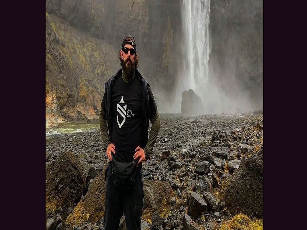 In front of a waterfall