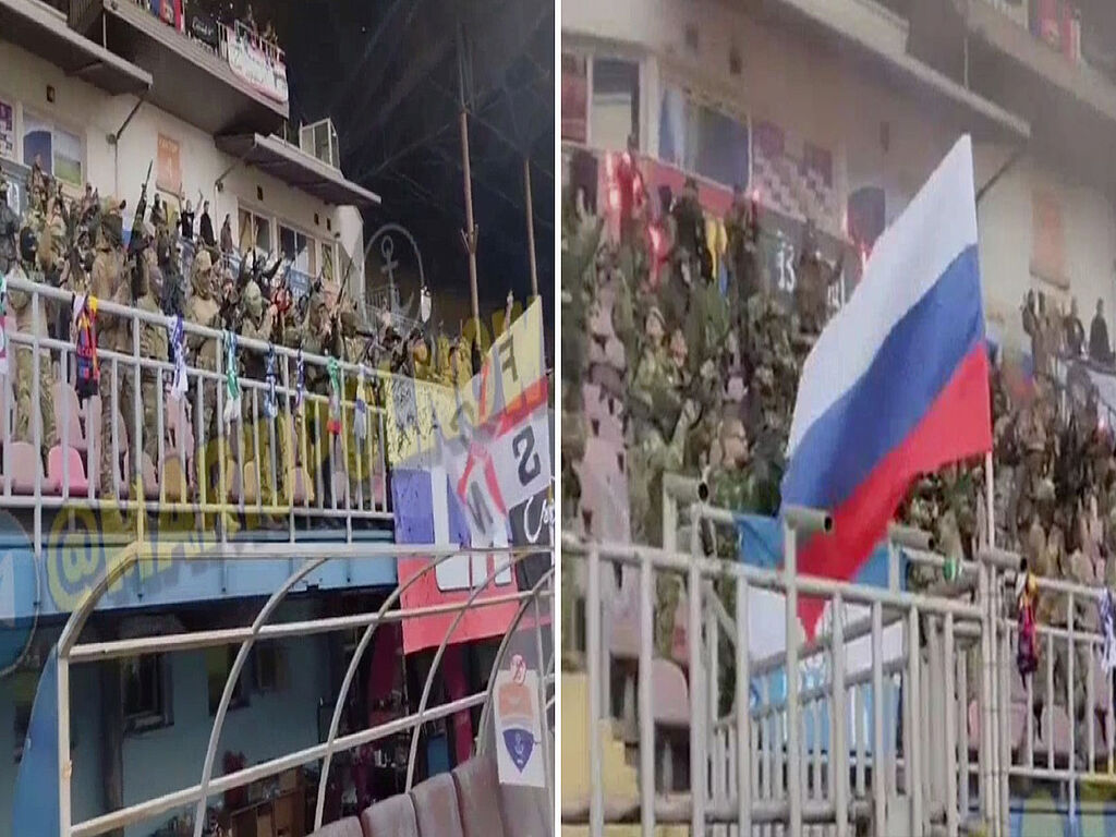 Stadium stands in Russian-occupied Mariupol. Russian Nazis are shooting chaotically into the air and having fun. 