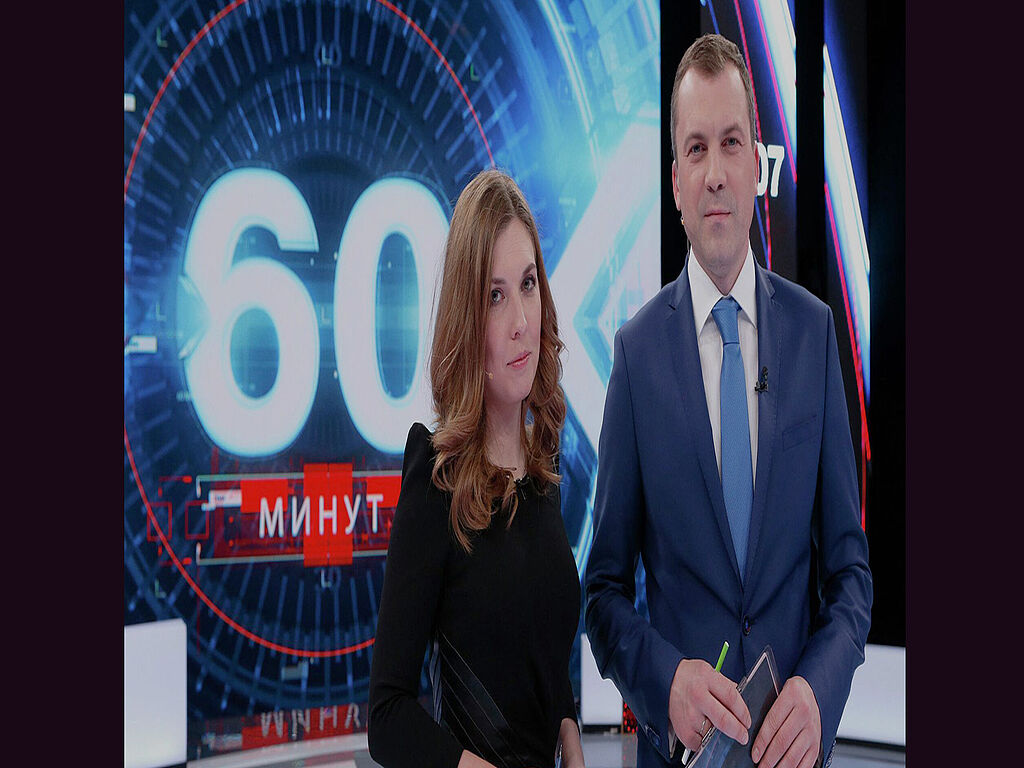 The second presenter of the 60 Minutes programme. She hosts the programme together with her husband, Yevgeny Popov. She was nicknamed "the cistern" because of the way she speaks. Olga often interrupts her interlocutors by speaking loudly