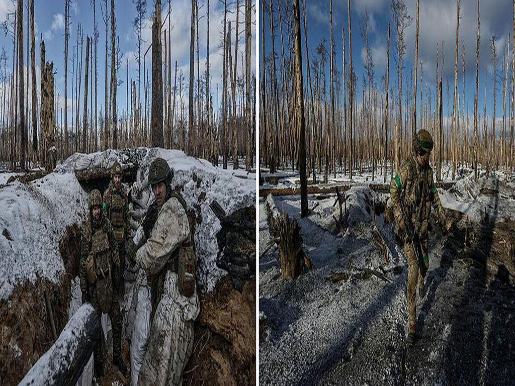 Ukrainian soldiers hold the defence