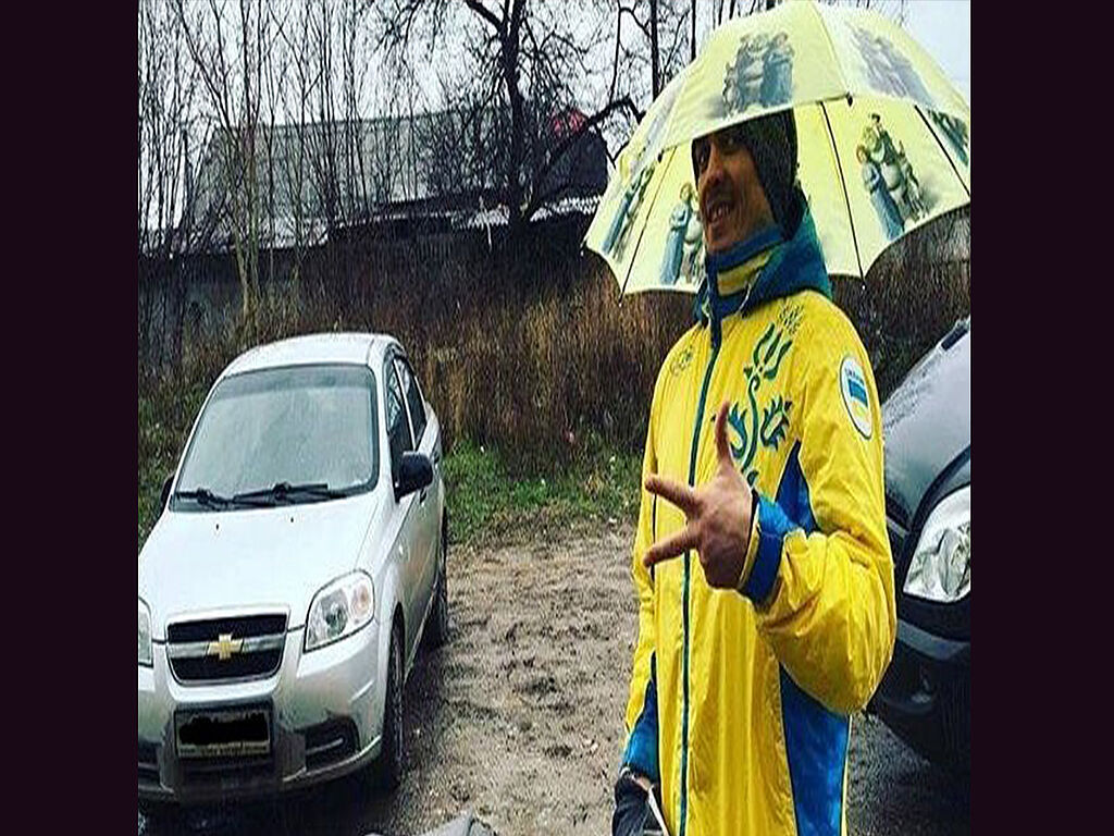 Boxer Oleksandr Usyk walks through Russian-occupied Crimea wearing a jacket with Ukrainian symbols