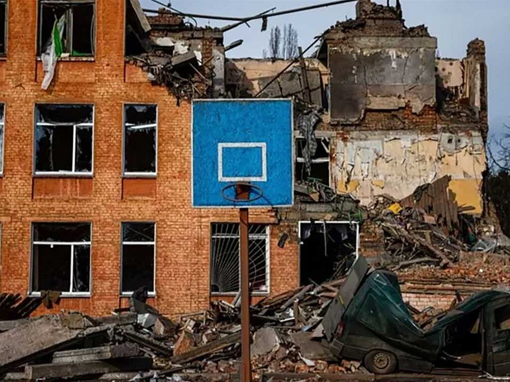 The photo shows a school on Serikov Street in Chernihiv. The school was badly damaged and people were hurt.