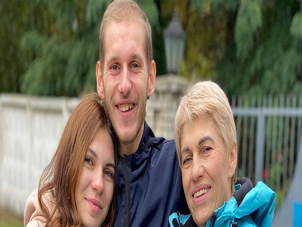 Dmytro with his family