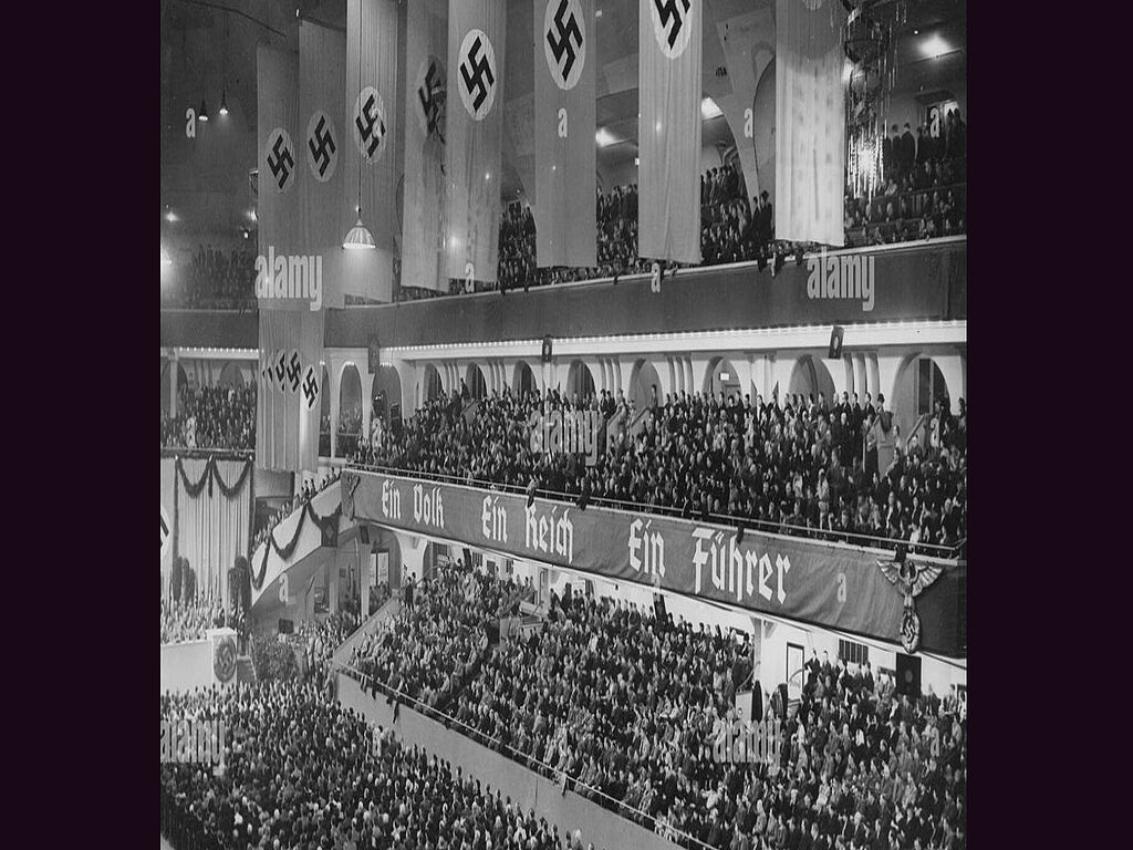 Assembly of Parliament. On the poster: one nation, one Reich, one Fuhrer.