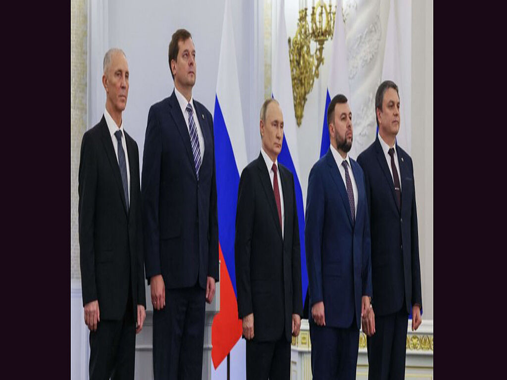 Traitors and the main terrorist listen to the Russian anthem