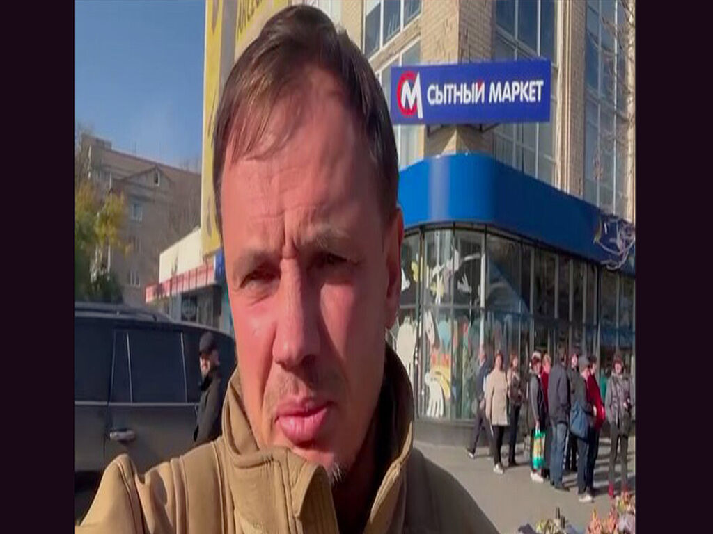 Near a grocery shop in Kherson. All the Russian occupants could do was to remove the logo of the Ukrainian chain of shops "ATB" and replace it with "Sityy Market"