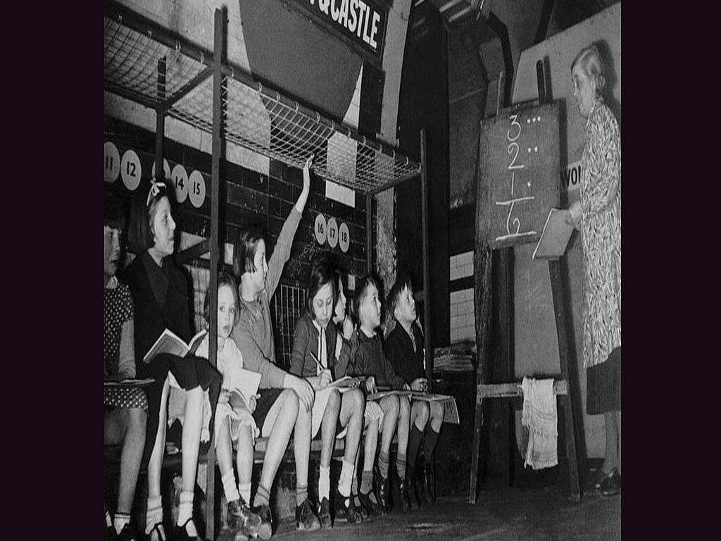 Children studying in the underground during the bombing