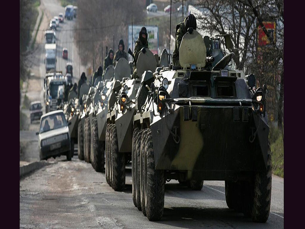 Russian armored vehicles drive along Crimean roads