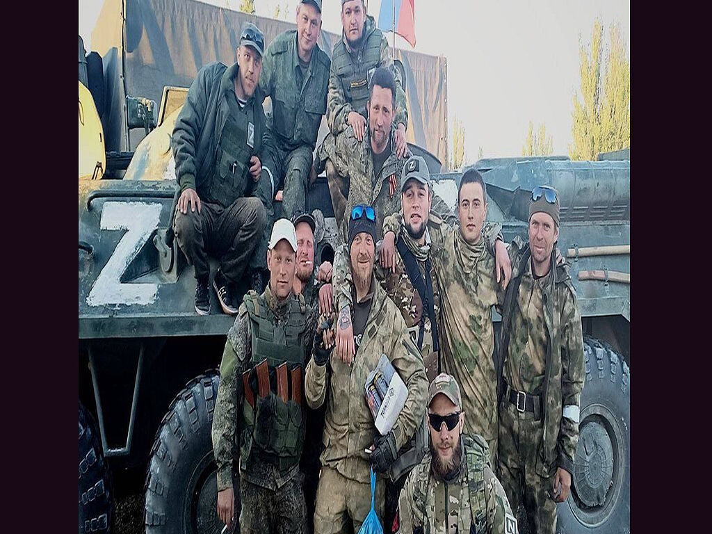 Photo with occupants. World War II veterans who liberated the world from Nazism are turning over in their coffins at what the Russian army is doing.