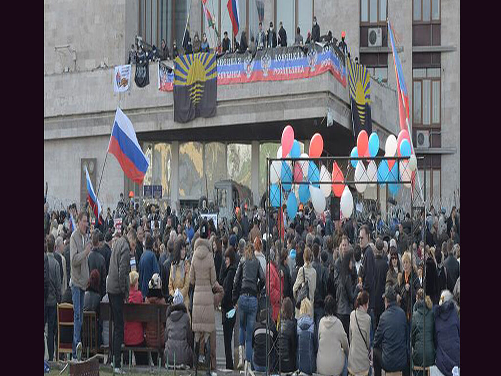 Pro-Russian civilians at a rally outside the administration building